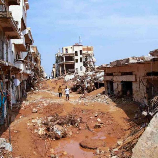 people-check-an-area-damaged-by-flash-floods-in-derna-eastern-libya-on-september-11-2023.jpg
